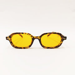 Sunglasses with yellow lenses and tortoiseshell frame