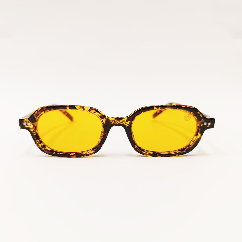 Sunglasses with yellow lenses and tortoiseshell frame