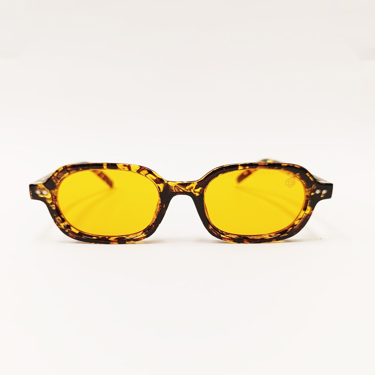 Sunglasses with yellow lenses and tortoiseshell frame